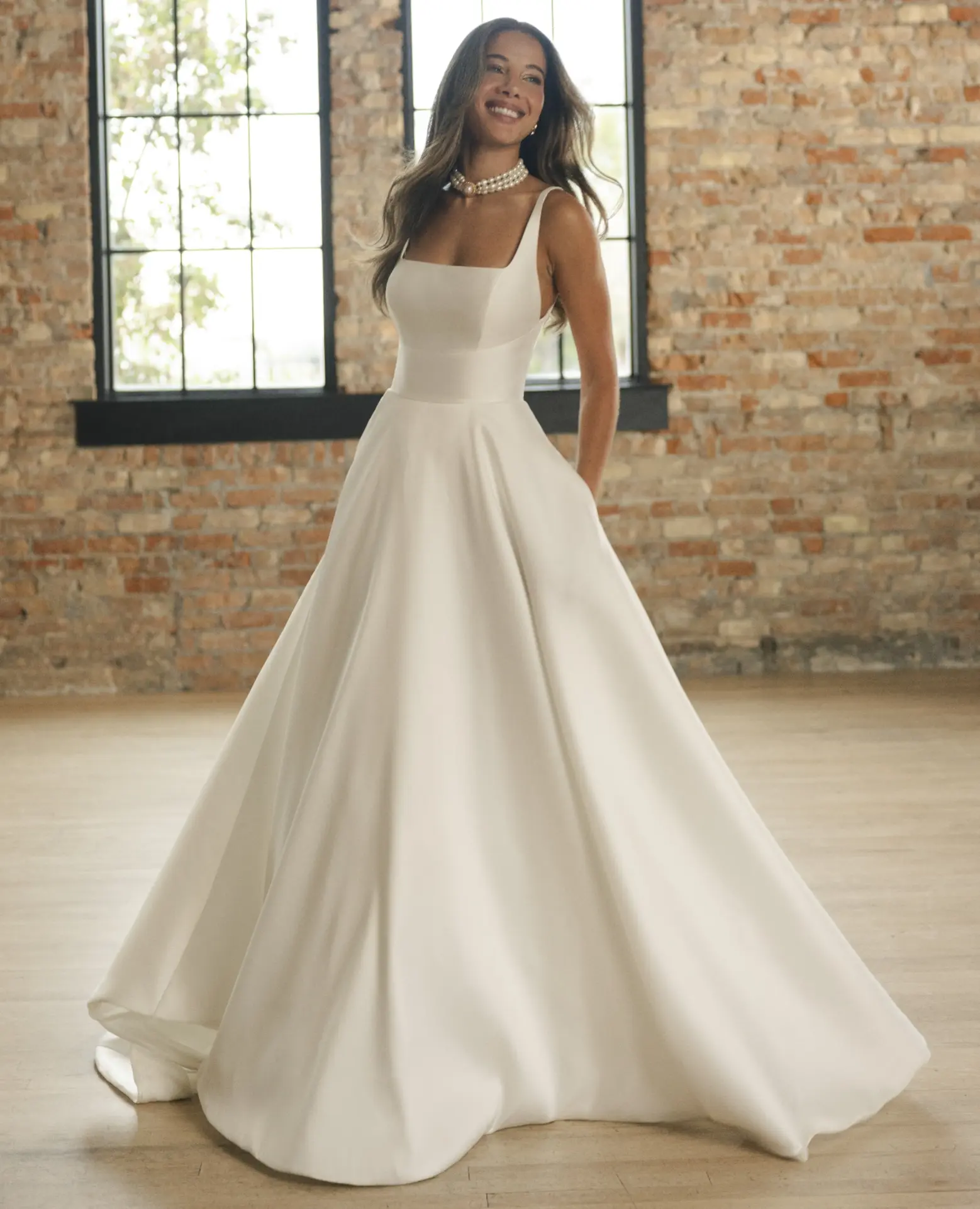 Model In A Studio Wearing Simple A Line Wedding Dress Called Galina And A Veil By Maggie Sottero