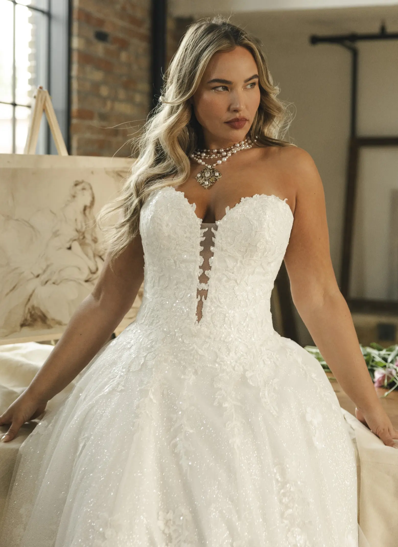 Model In A Studio Wearing Lace A Line Wedding Dress Called Jennifer By Maggie Sottero