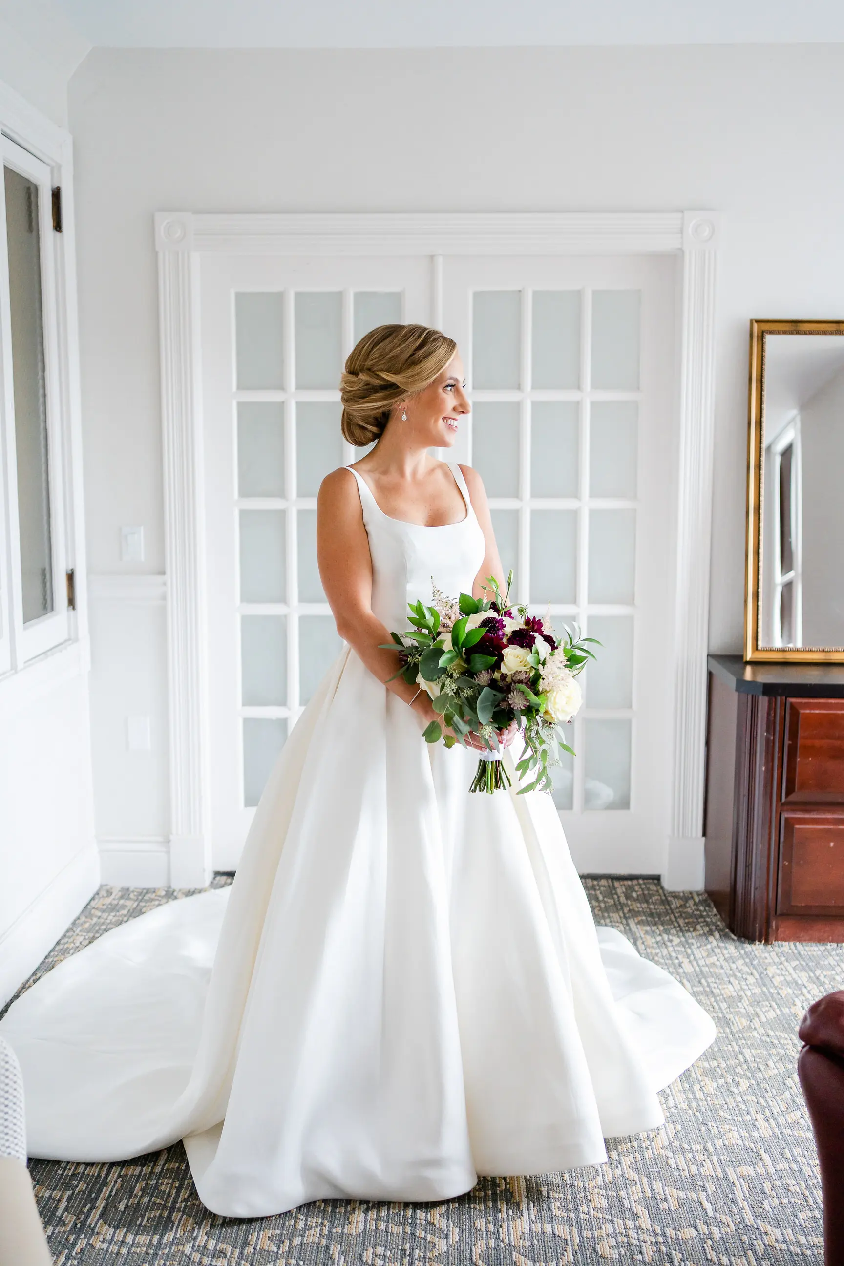 Bride wearing Simple Ballgown Wedding Dress called Selena by Maggie Sottero