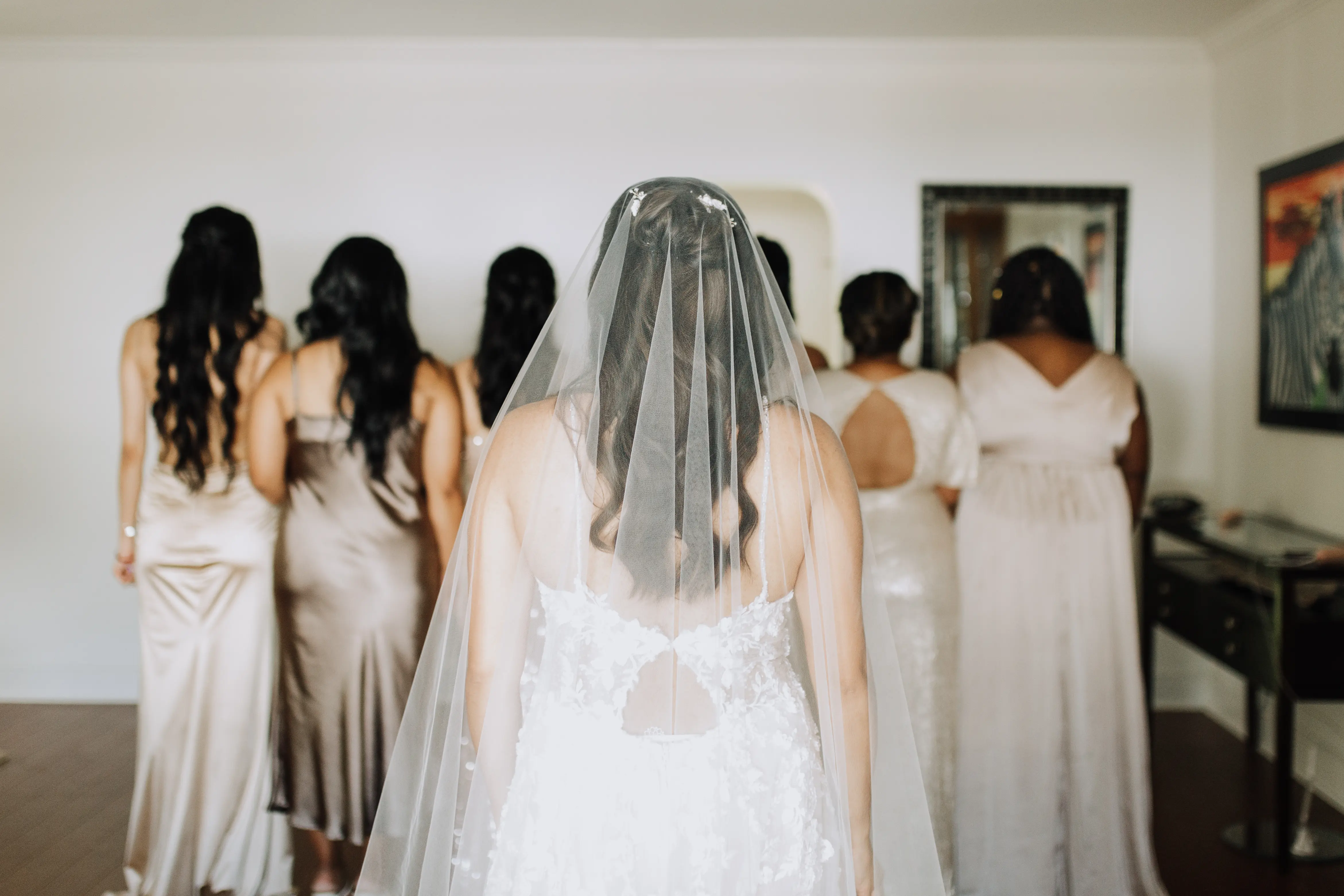 Bride Wearing A-Line Romantic Wedding Dress Called Marlow By Sottero And Midgley Keyhole Back With Bridesmaids